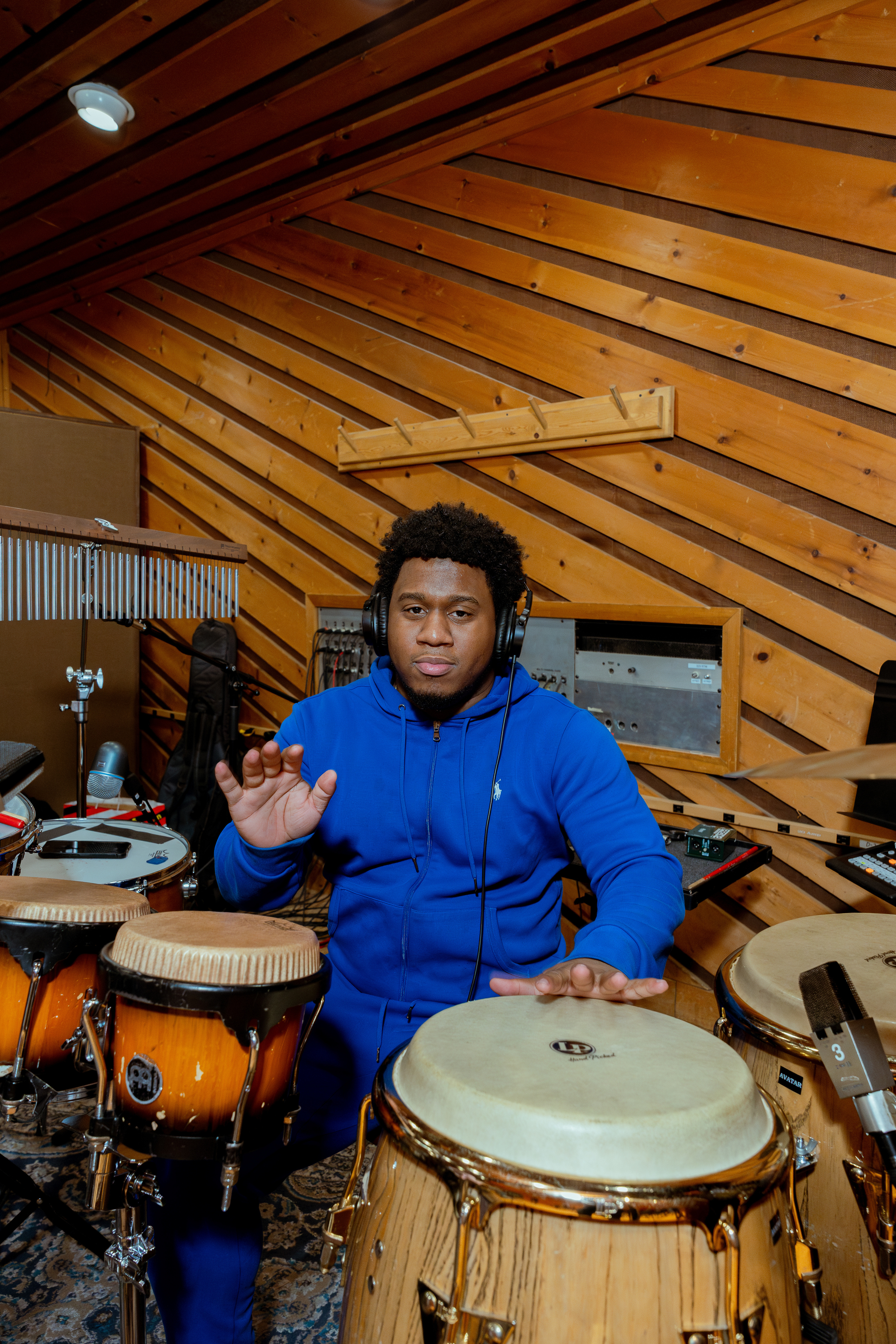 A percussionist at the congas during a session